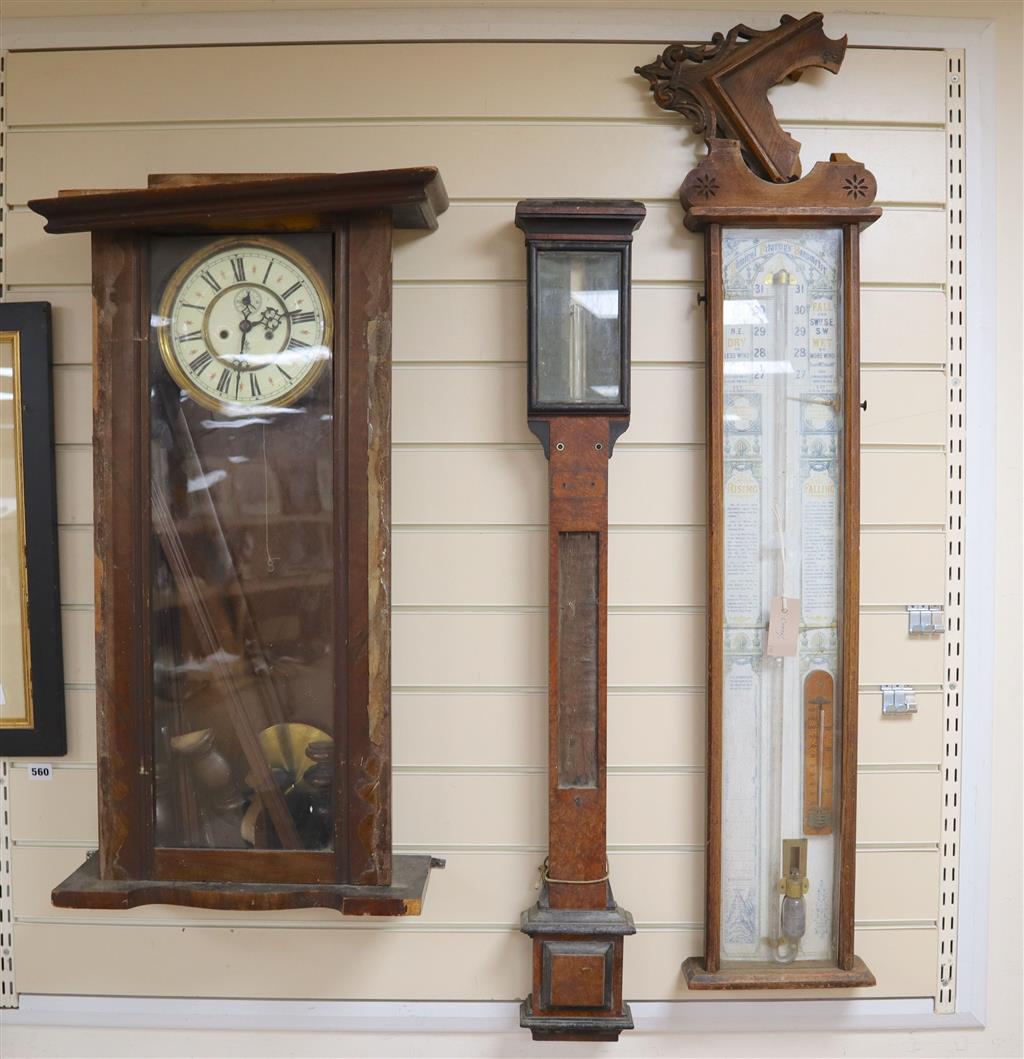 A Negretti and Zambra oak stick barometer, an admiral fitzroy barometer, a german wall clock - restoration needed